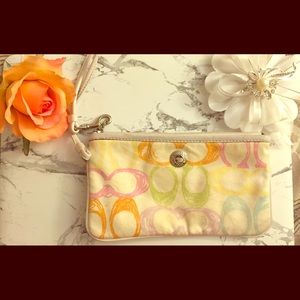 100% authentic coach wristlet